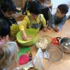 Middle Pre-Primary making apple crumble as part of their IPC food unit.